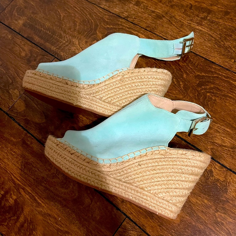 Women’s size 7 Kenneth Cole wedge sandals. Never worn!